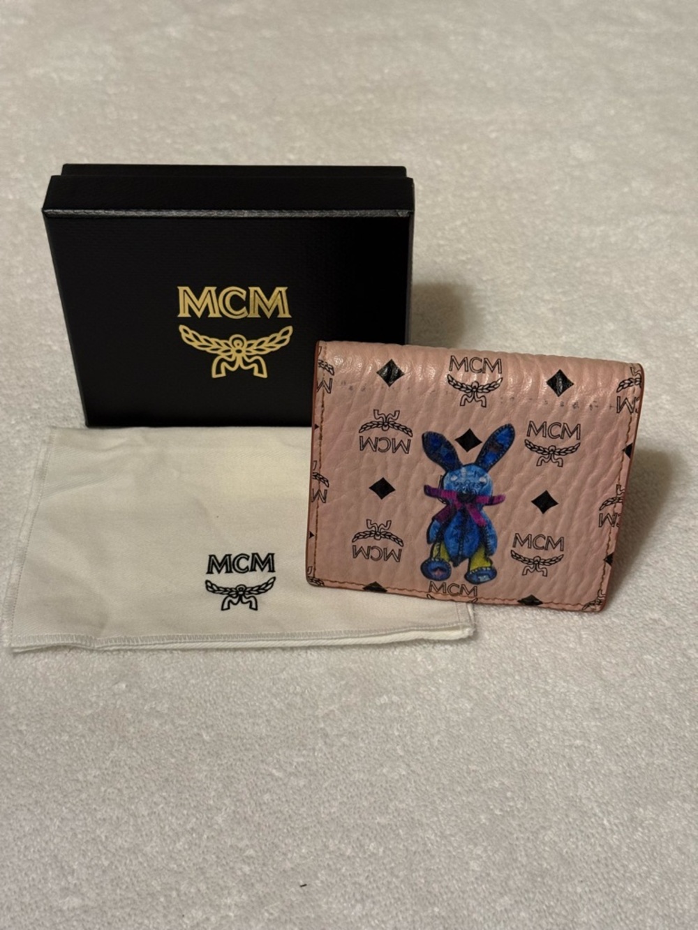 MCM Pink Logo Leather Bi-Fold Wallet with Blue Bunny Motif